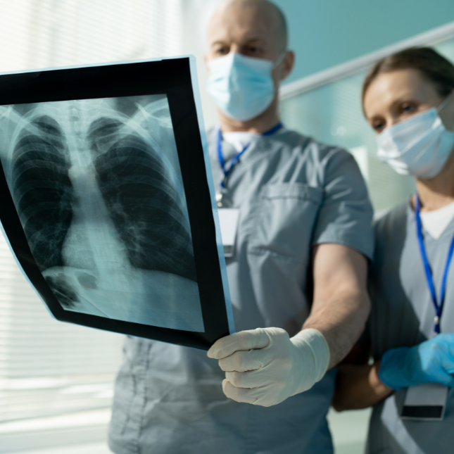 doctors with x-ray of lung