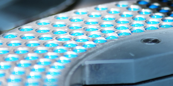 pills being manufactured and sorted